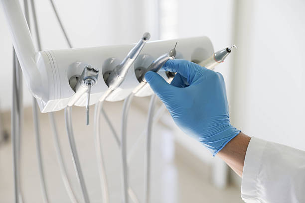 Professional Tooth Extraction technician working in Wareham Center, MA